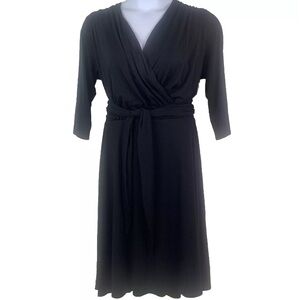 Melissa Masse Wrap Dress Women’s size 1x
Black Faux Wrap New With Tags Classic